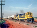 ATSF_6387_South_Train_185_at_Otoe_OK_09-01-81