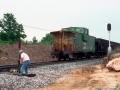 BN_Caboose_10411_Eastbound_Loaded_Coal_Fruitland_TX_05-90